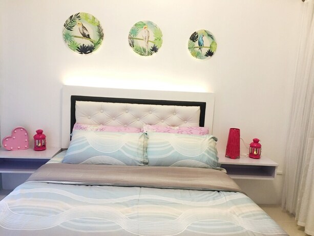Imagen de la habitación del Hotel Homestay At Wind Residences. Foto 23