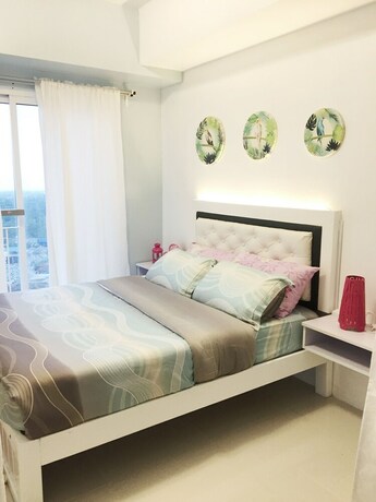 Imagen de la habitación del Hotel Homestay At Wind Residences. Foto 26