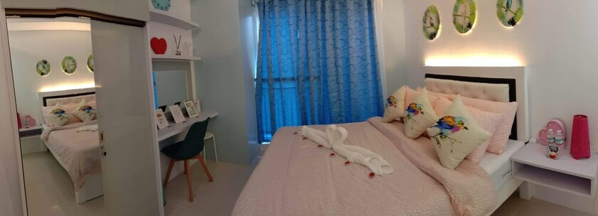 Imagen de la habitación del Hotel Homestay At Wind Residences. Foto 30