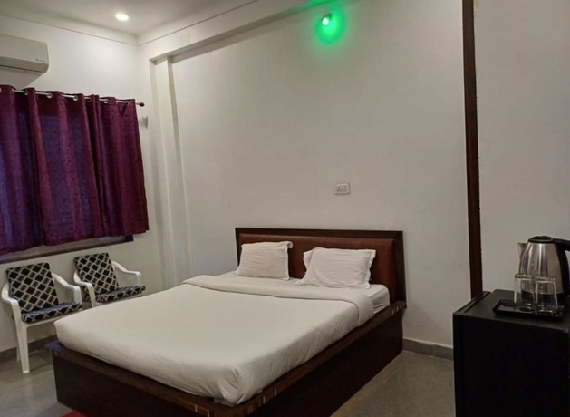 Imagen de la habitación del Hotel Homestay Chittor Inn Chittorgarh. Foto 7