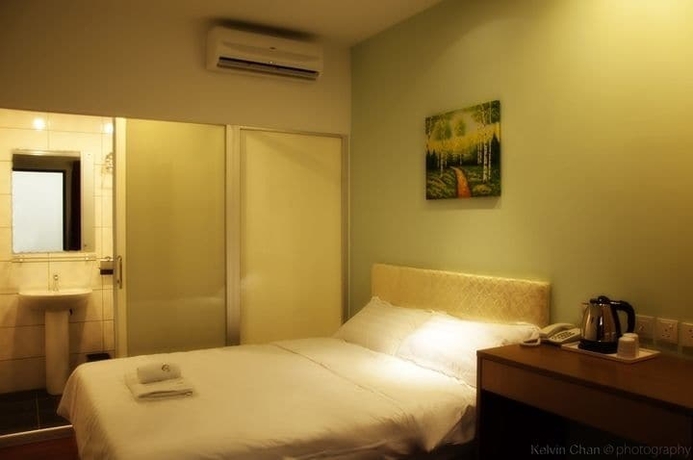 Imagen de la habitación del Hotel Homestay Kuching. Foto 4