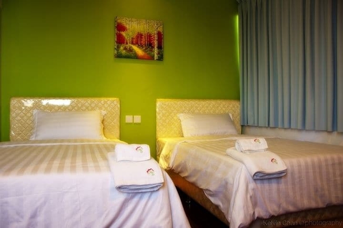 Imagen de la habitación del Hotel Homestay Kuching. Foto 5