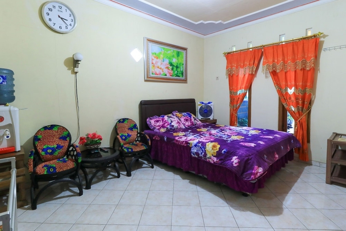 Imagen de la habitación del Hotel Homestay Pelangi Batu. Foto 2