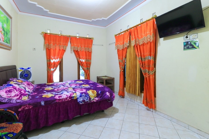 Imagen de la habitación del Hotel Homestay Pelangi Batu. Foto 3