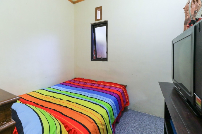 Imagen de la habitación del Hotel Homestay Pelangi Batu. Foto 4