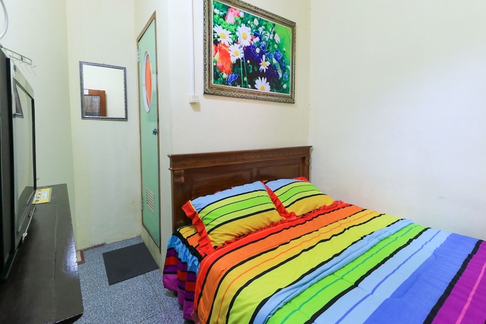 Imagen de la habitación del Hotel Homestay Pelangi Batu. Foto 5