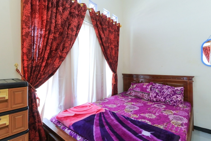 Imagen de la habitación del Hotel Homestay Pelangi Batu. Foto 6