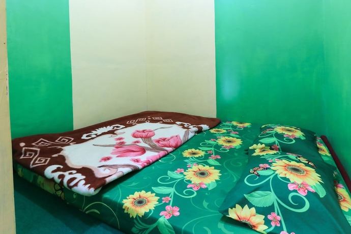Imagen de la habitación del Hotel Homestay Pelangi Batu. Foto 7