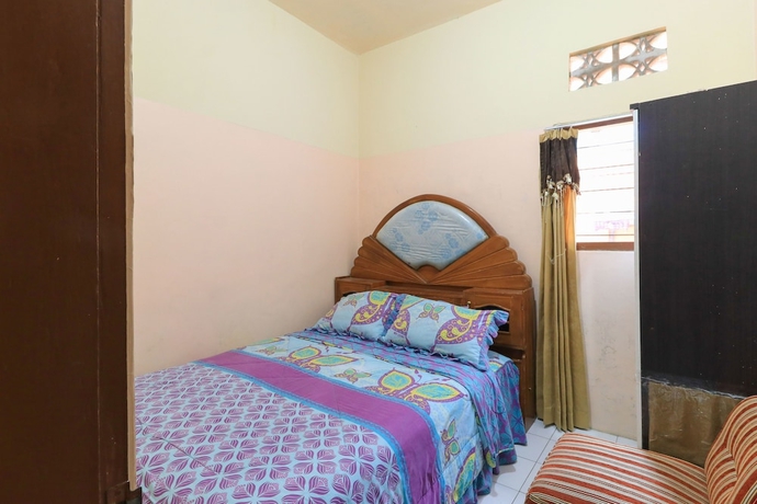 Imagen de la habitación del Hotel Homestay Pelangi Batu. Foto 8