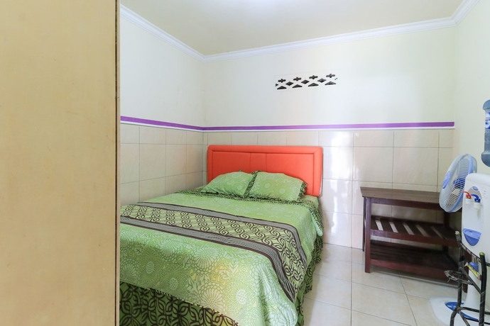 Imagen de la habitación del Hotel Homestay Pelangi Batu. Foto 13