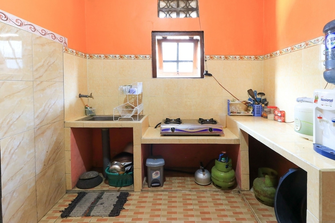 Imagen de la habitación del Hotel Homestay Pelangi Batu. Foto 15