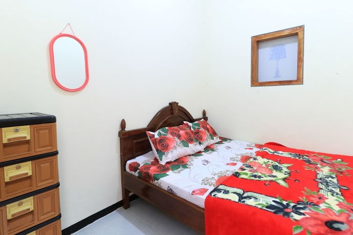 Imagen de la habitación del Hotel Homestay Pelangi Batu. Foto 17