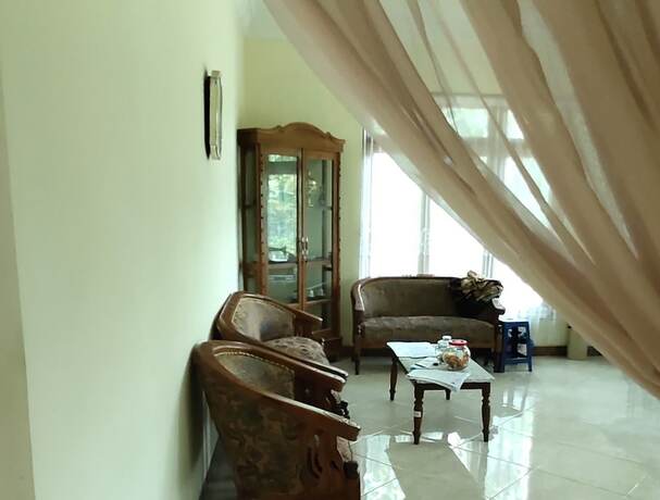 Imagen de la habitación del Hotel Homestay Sudiono. Foto 14