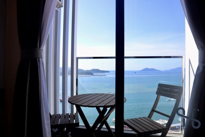 Imagen de la habitación del Hotel Homesuite' Home At The Shore Kk. Foto 11