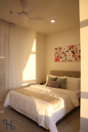 Imagen de la habitación del Hotel Homesuite' Home At The Shore Kk. Foto 13