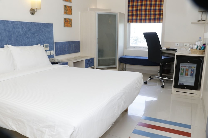 Imagen de la habitación del Hotel Hometel Chandigarh. Foto 5