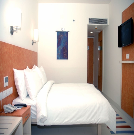 Imagen de la habitación del Hotel Hometel Chandigarh. Foto 6