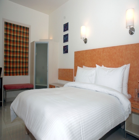 Imagen de la habitación del Hotel Hometel Chandigarh. Foto 7