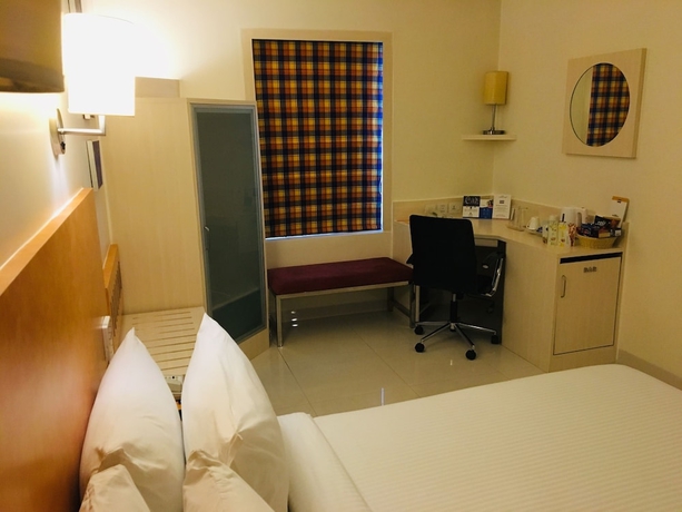 Imagen de la habitación del Hotel Hometel Chandigarh. Foto 8