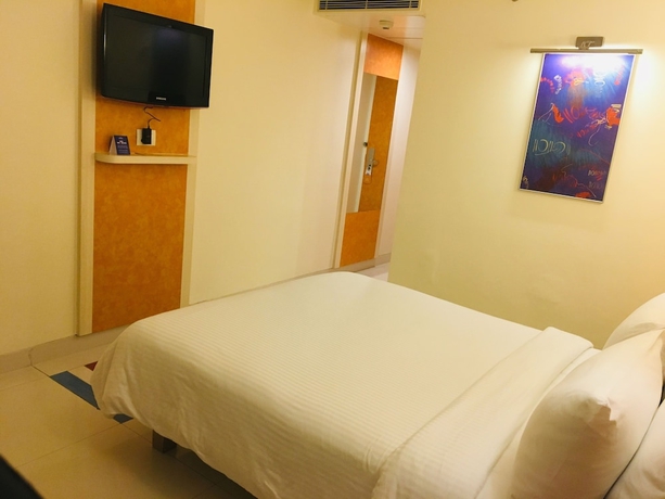 Imagen de la habitación del Hotel Hometel Chandigarh. Foto 10