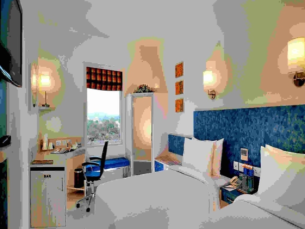 Imagen de la habitación del Hotel Hometel Chandigarh. Foto 13