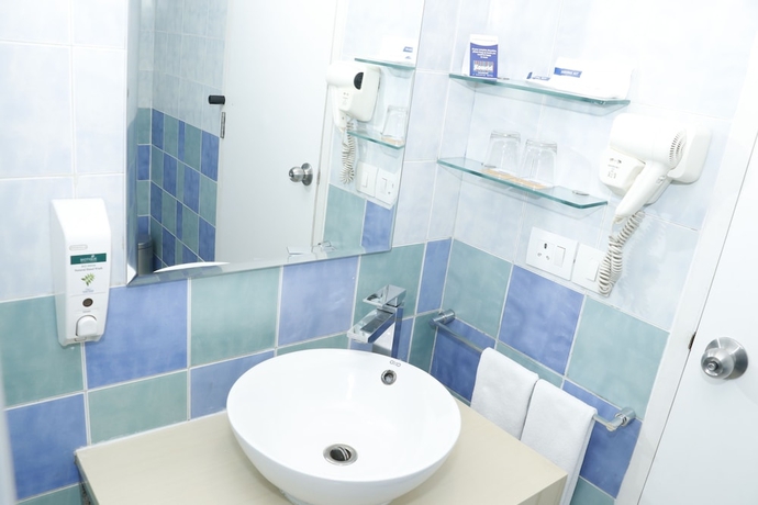 Imagen de la habitación del Hotel Hometel Chandigarh. Foto 17