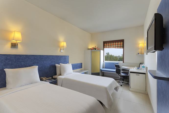 Imagen de la habitación del Hotel Hometel Roorkee. Foto 7