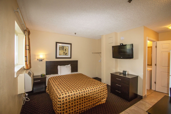 Imagen de la habitación del Hotel Hometowne Studios By Red Roof Orlando South. Foto 12