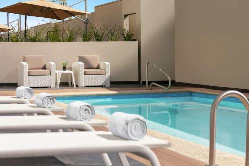 Imagen de la piscina del Hotel Homewood Suites By Hilton Monterrey Apodaca, Apodaca. Foto 20