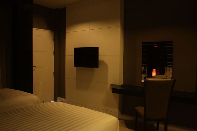 Imagen de la habitación del Hotel Homey Dormy Chiangrai. Foto 2