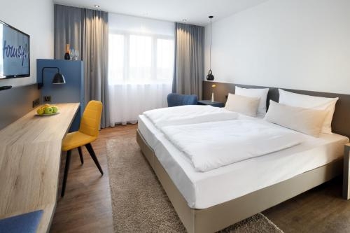 Imagen de la habitación del Hotel Homey!. Foto 9