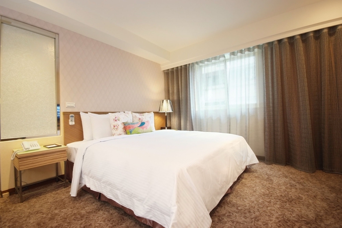 Imagen de la habitación del Hotel Homey House. Foto 2