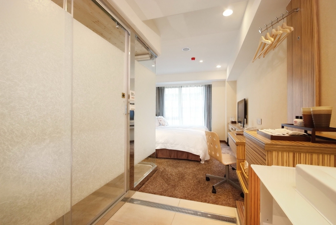 Imagen de la habitación del Hotel Homey House. Foto 6