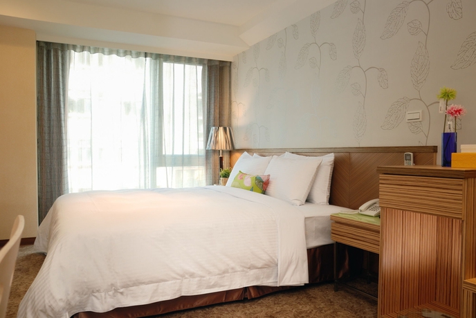 Imagen de la habitación del Hotel Homey House. Foto 10