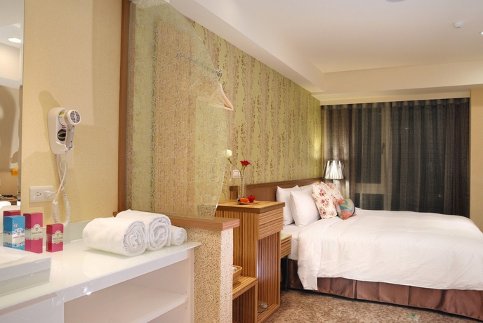 Imagen de la habitación del Hotel Homey House. Foto 12