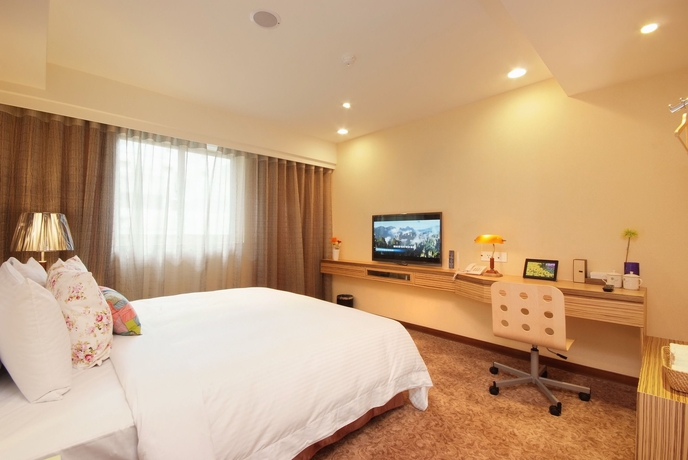 Imagen de la habitación del Hotel Homey House. Foto 16