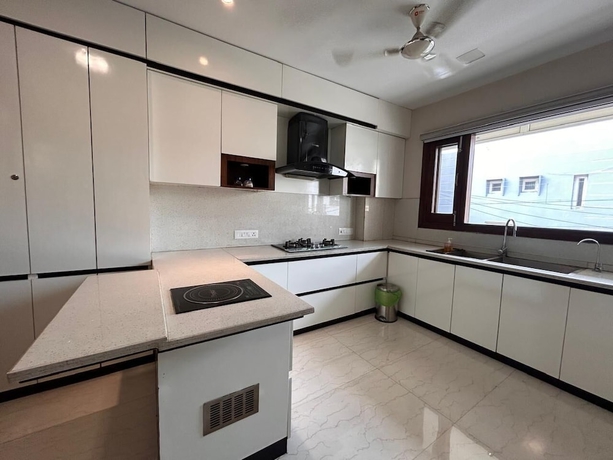 Imagen de la habitación del Hotel HomiStay - 3BHK. Foto 13