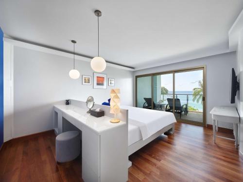 Imagen de la habitación del Hotel Homm Bliss Southbeach Patong. Foto 7