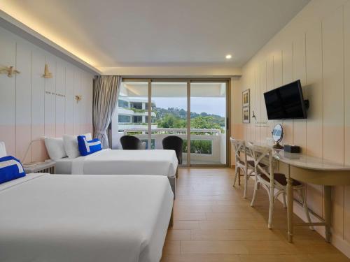 Imagen de la habitación del Hotel Homm Bliss Southbeach Patong. Foto 15
