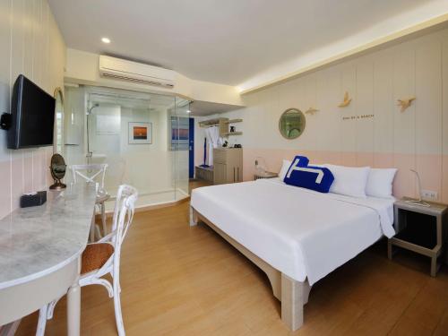 Imagen de la habitación del Hotel Homm Bliss Southbeach Patong. Foto 16