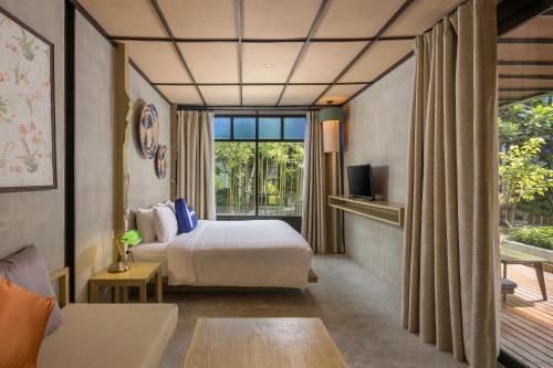 Imagen de la habitación del Hotel Homm Chura Samui. Foto 12