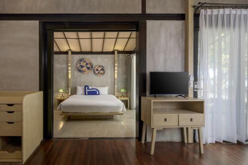 Imagen de la habitación del Hotel Homm Chura Samui. Foto 13