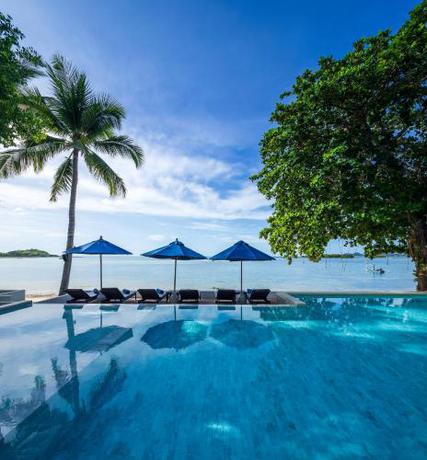 Imagen de la piscina del Hotel Homm Chura Samui. Foto 17