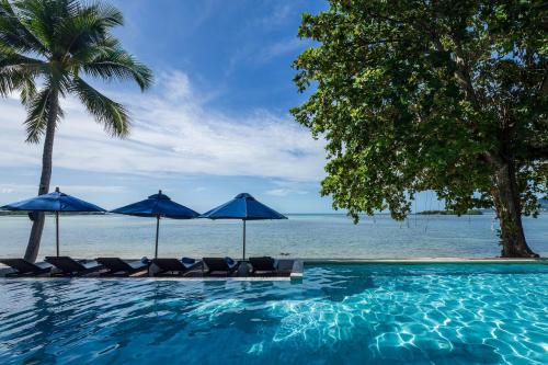 Imagen de la piscina del Hotel Homm Chura Samui. Foto 19