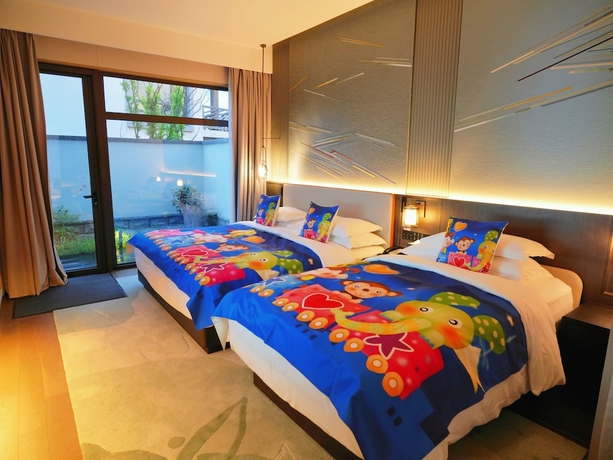 Imagen de la habitación del Hotel Homm Huzhou Xisai Shan. Foto 9