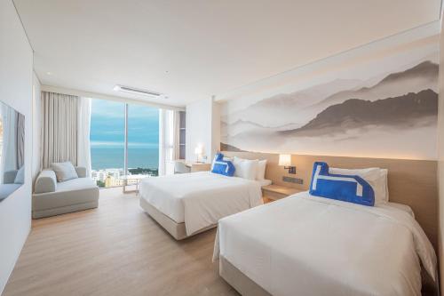 Imagen de la habitación del Hotel Homm Marina Sokcho. Foto 10