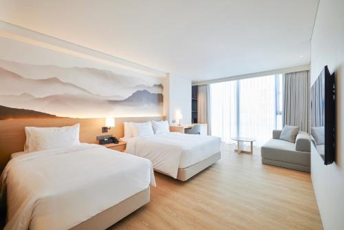 Imagen de la habitación del Hotel Homm Marina Sokcho. Foto 15
