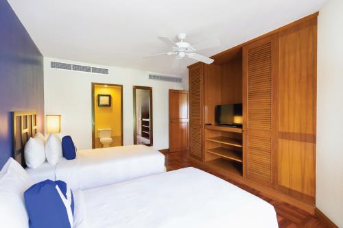 Imagen de la habitación del Hotel Homm Suites Laguna. Foto 18
