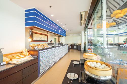 Imagen del bar/restaurante del Hotel Homm Suites Laguna. Foto 11