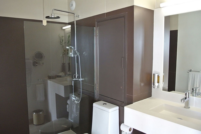 Imagen de la habitación del Hotel Hommage and Residences. Foto 7